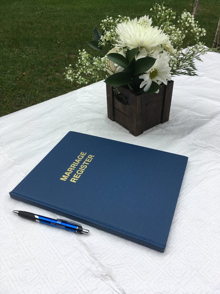 Ontario marriage register on a ceremony table